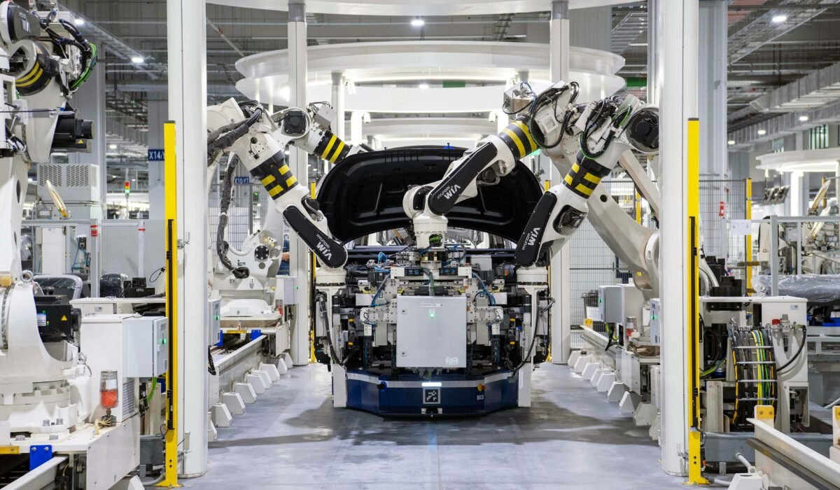 High-tech robots assembling a car in a modern factory setting, showcasing automation. — Photo by Hyundai Motor Group on Pexels